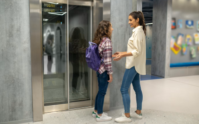 woman-girl-talking-before-closed-elevator-doors_259150-59966